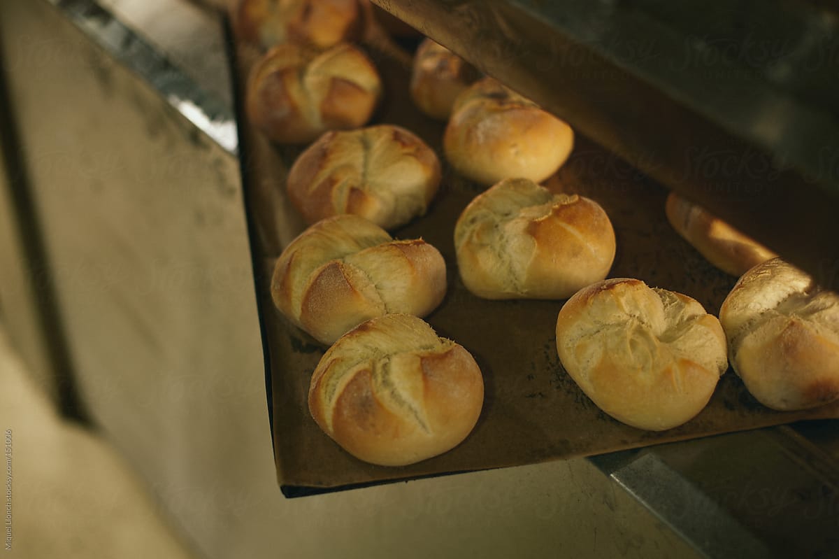 Fresh baked rolls on oven tray