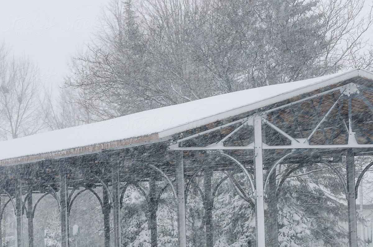 park pavilion structure in a snowstorm