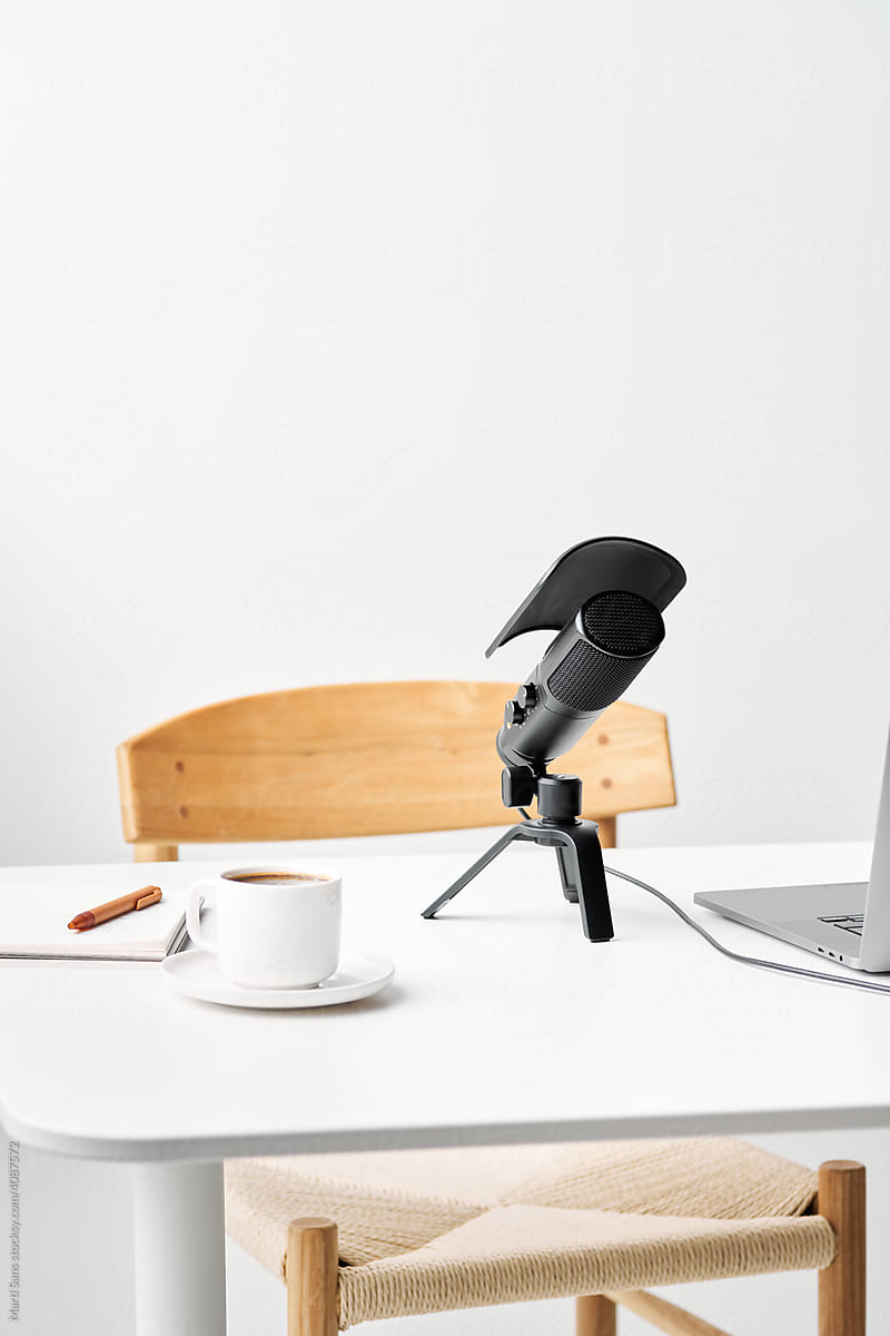 Microphone and coffee on desk