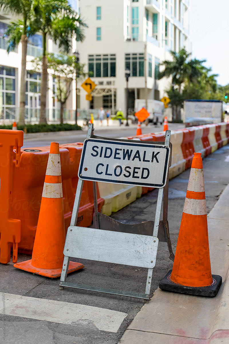 Sidewalk closed sign on the street