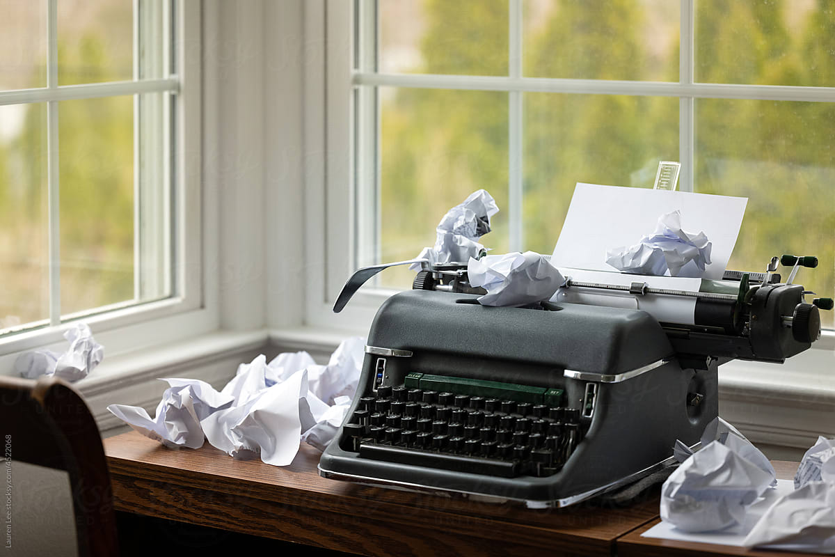 Typewriter with crumpled up paper