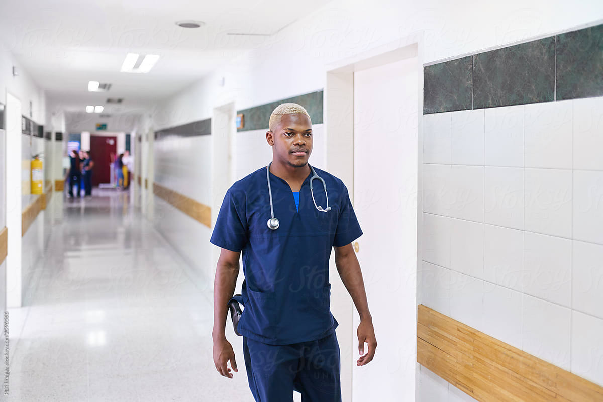Hospital: Black medical doctor in healthcare hospital.