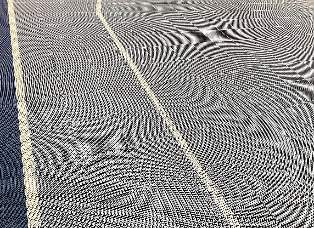 grey plastic floor with white lines