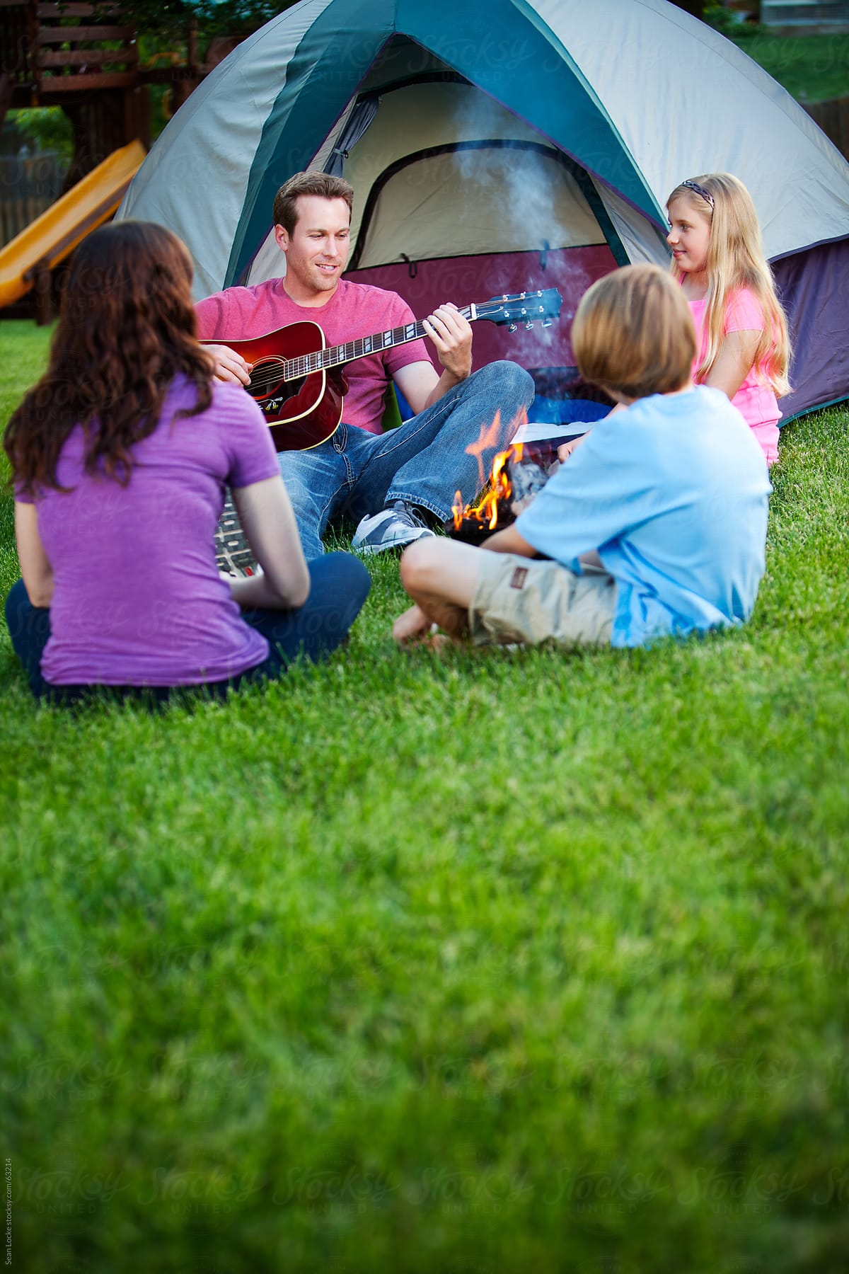 Camping: Dad Plays Guitar Around Campfire