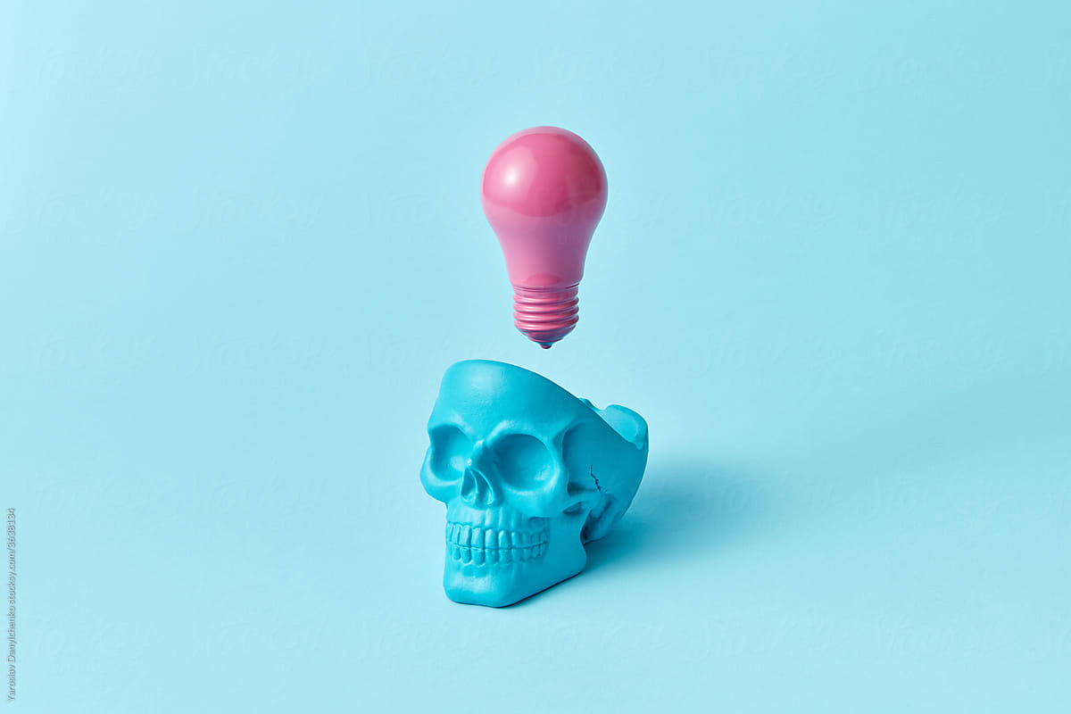 Pink light bulb and skull