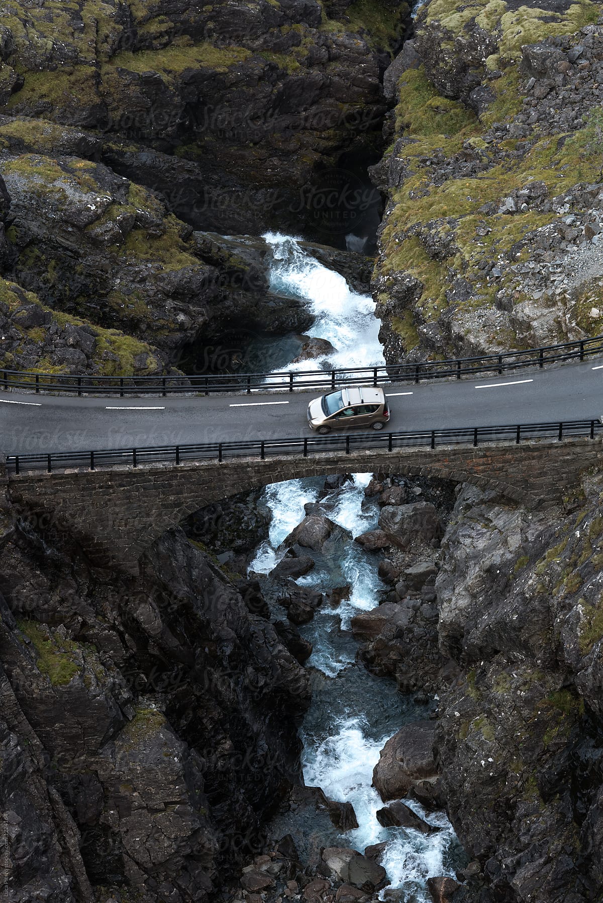 Lonely car on Trollstigen mountain road, Norway