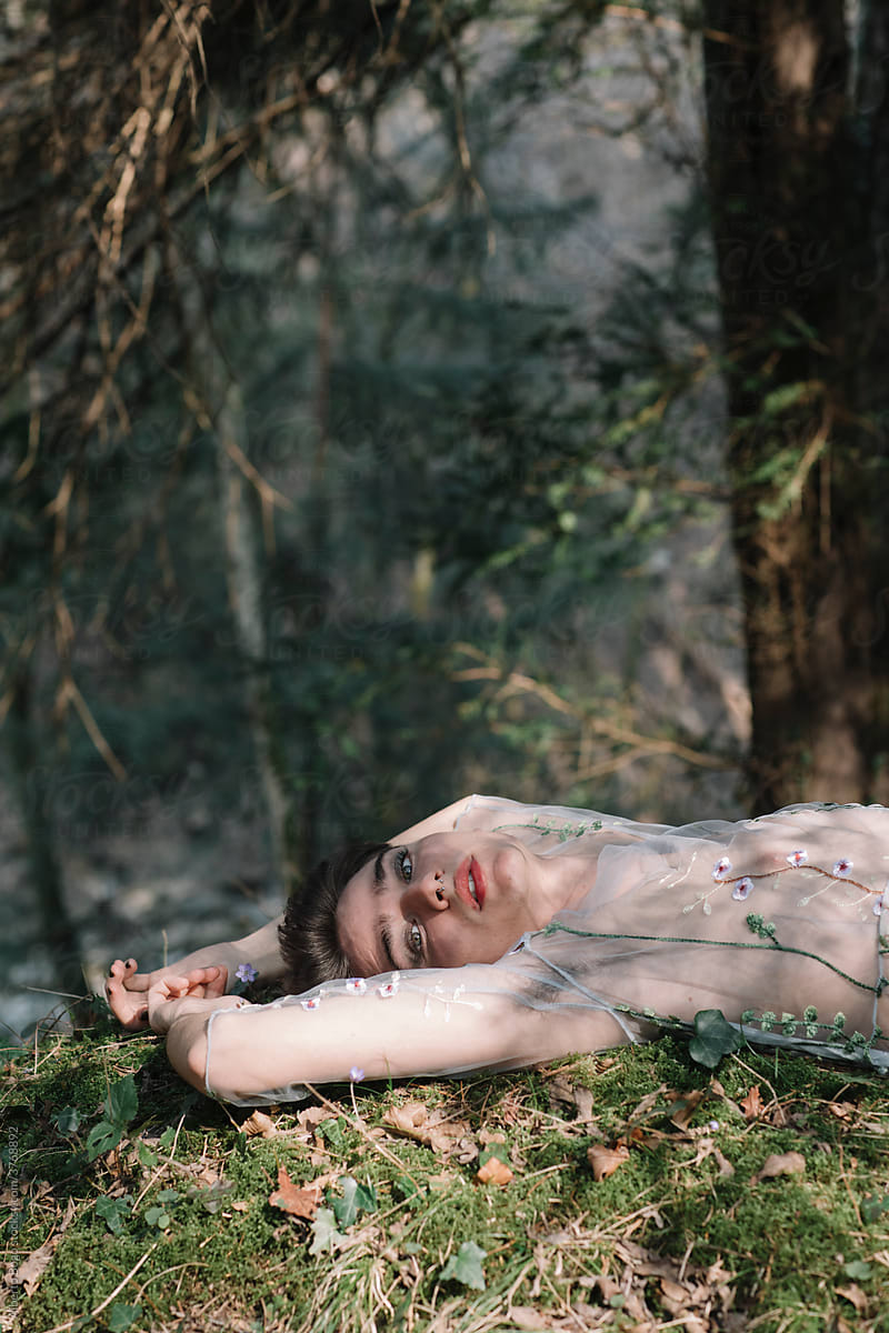 Portrait Of A Non-binary Man Lying In The Woods