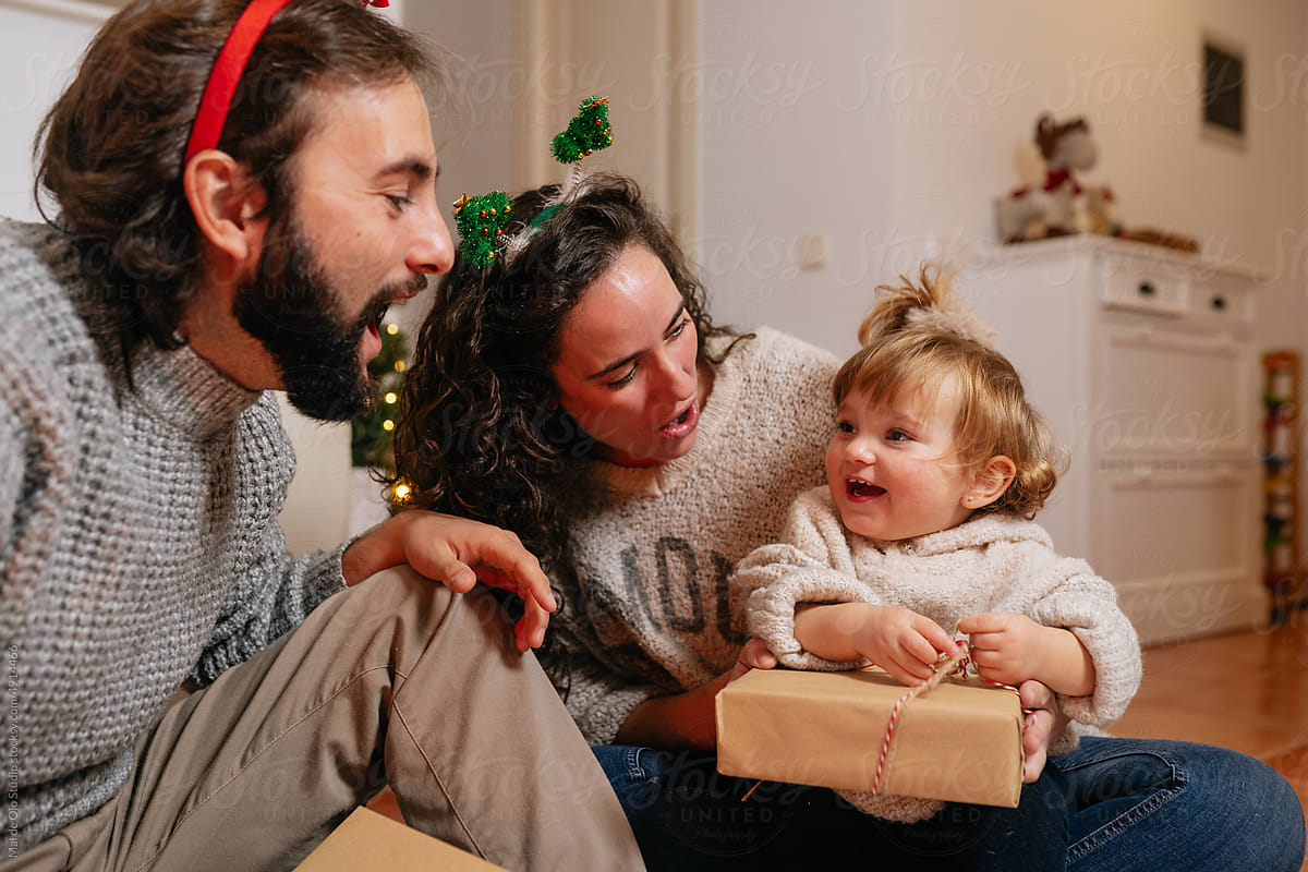 Family ready to open Christmas gifts