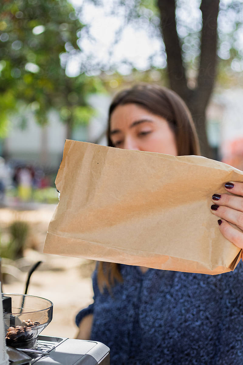 woman using a paper bag