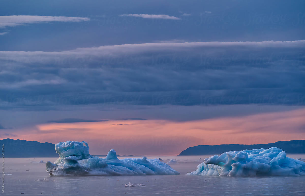 Foggy Icebergs During Midnight Sun