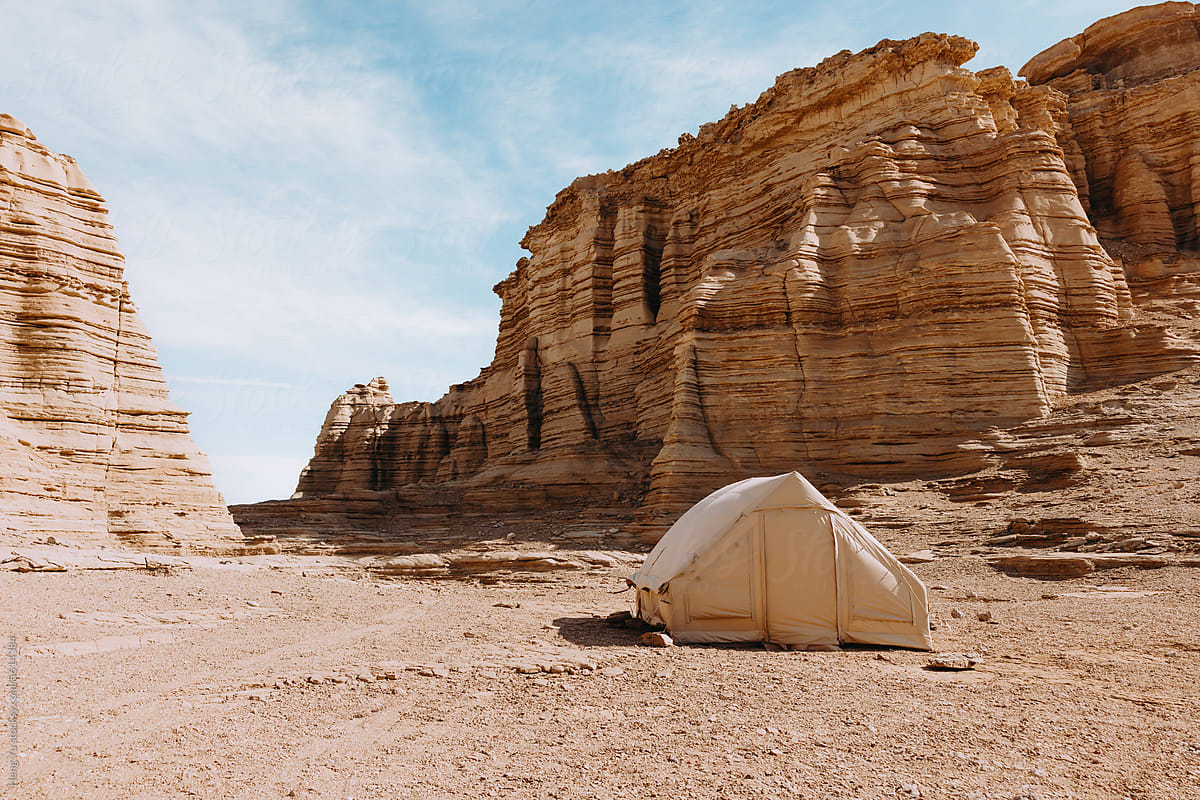 Desert Expedition Tent against Striated Rock Formations