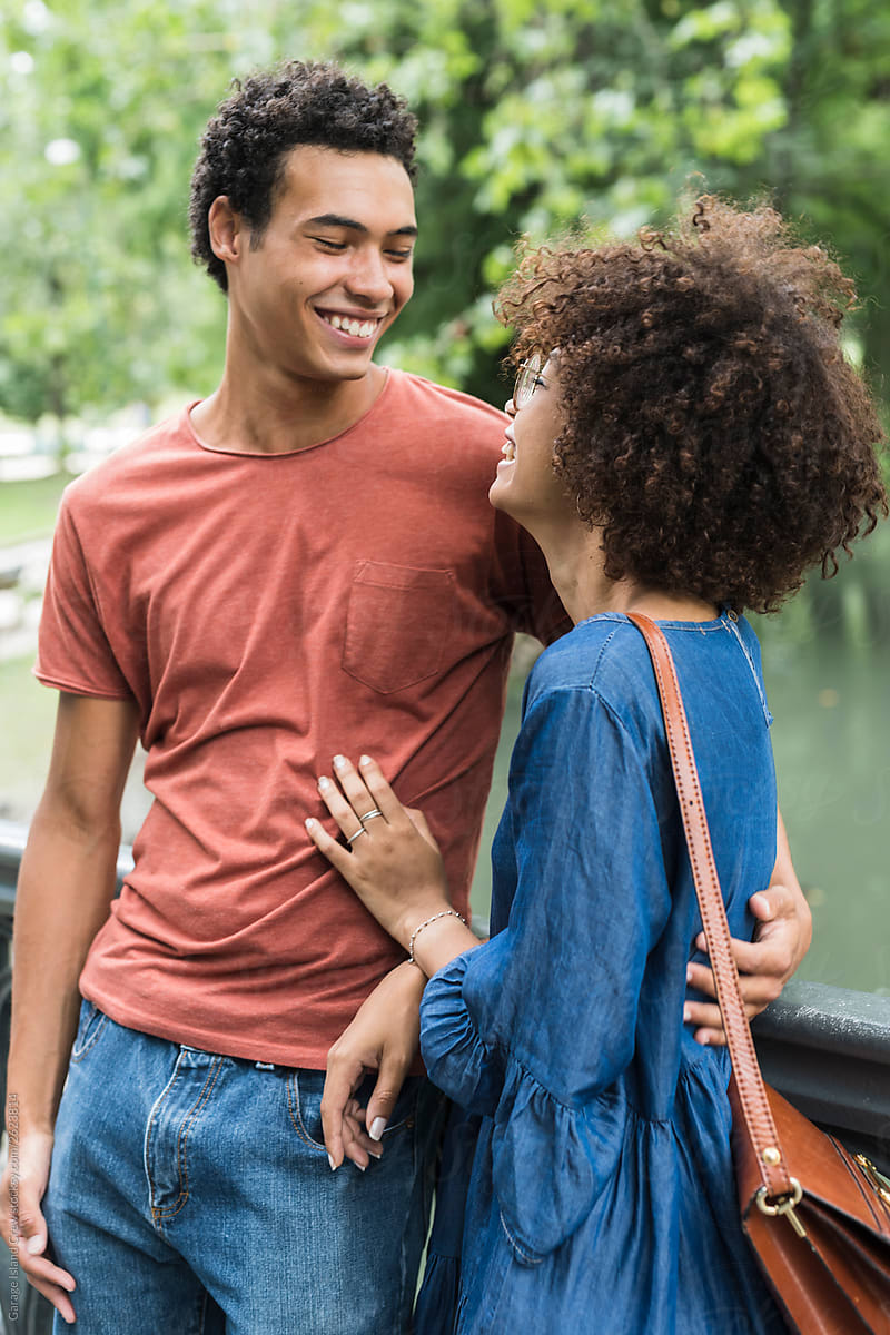 Happy young black couple in the park