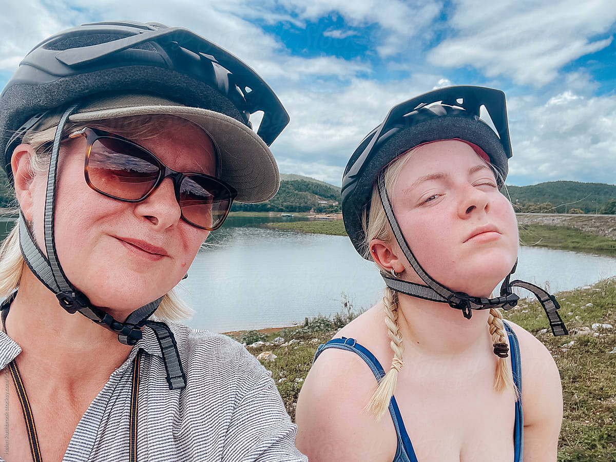 Teenage girl and her Mother cycling selfie