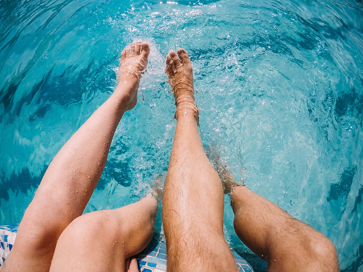 Couple legs feet nature outdoor summer swimming pool water ugc