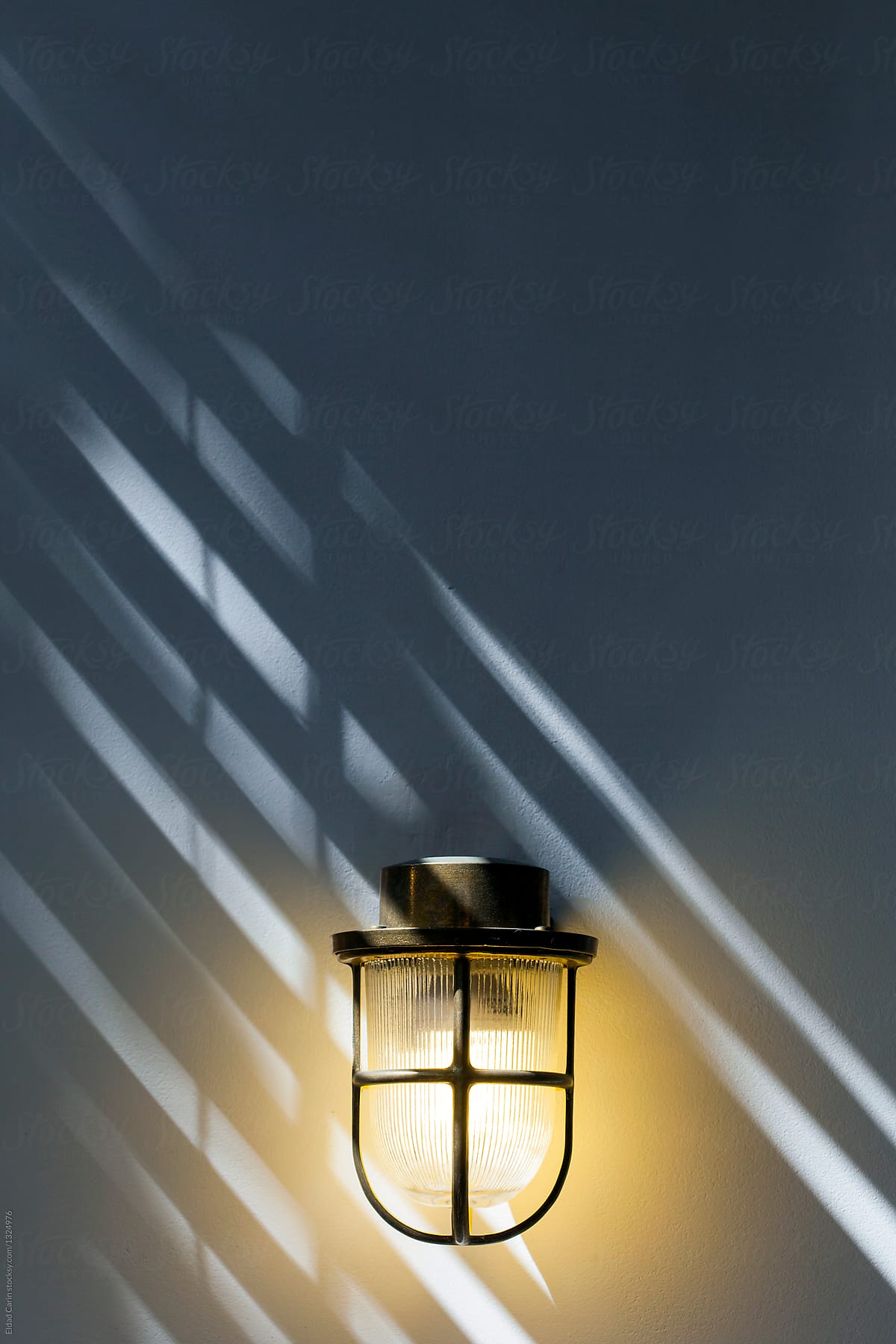 Brass Lamp on Pink Wall