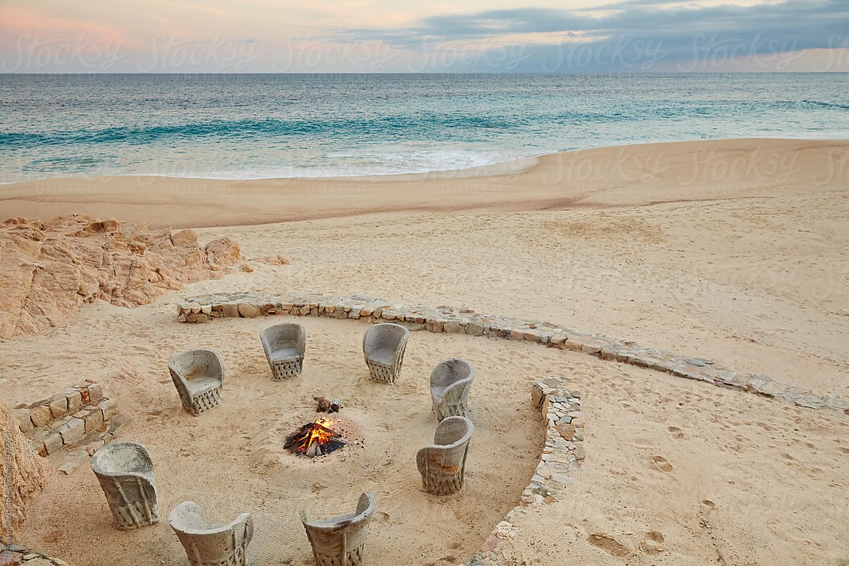 Outdoor firepit on the beach at dusk