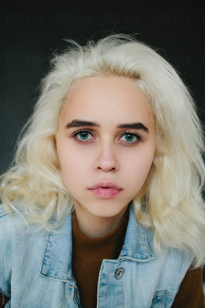 Close Up Portrait Of A Cute Teen Girl With Blonde Hair