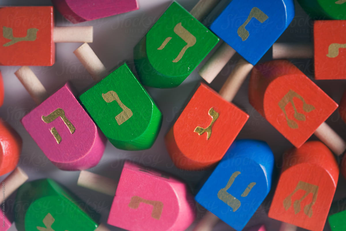 Hanukkah: Overhead View Of Many Colored Dreidels
