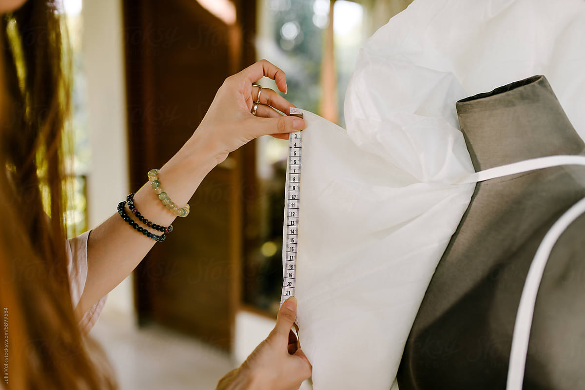 Dressmaker Taking Measurements