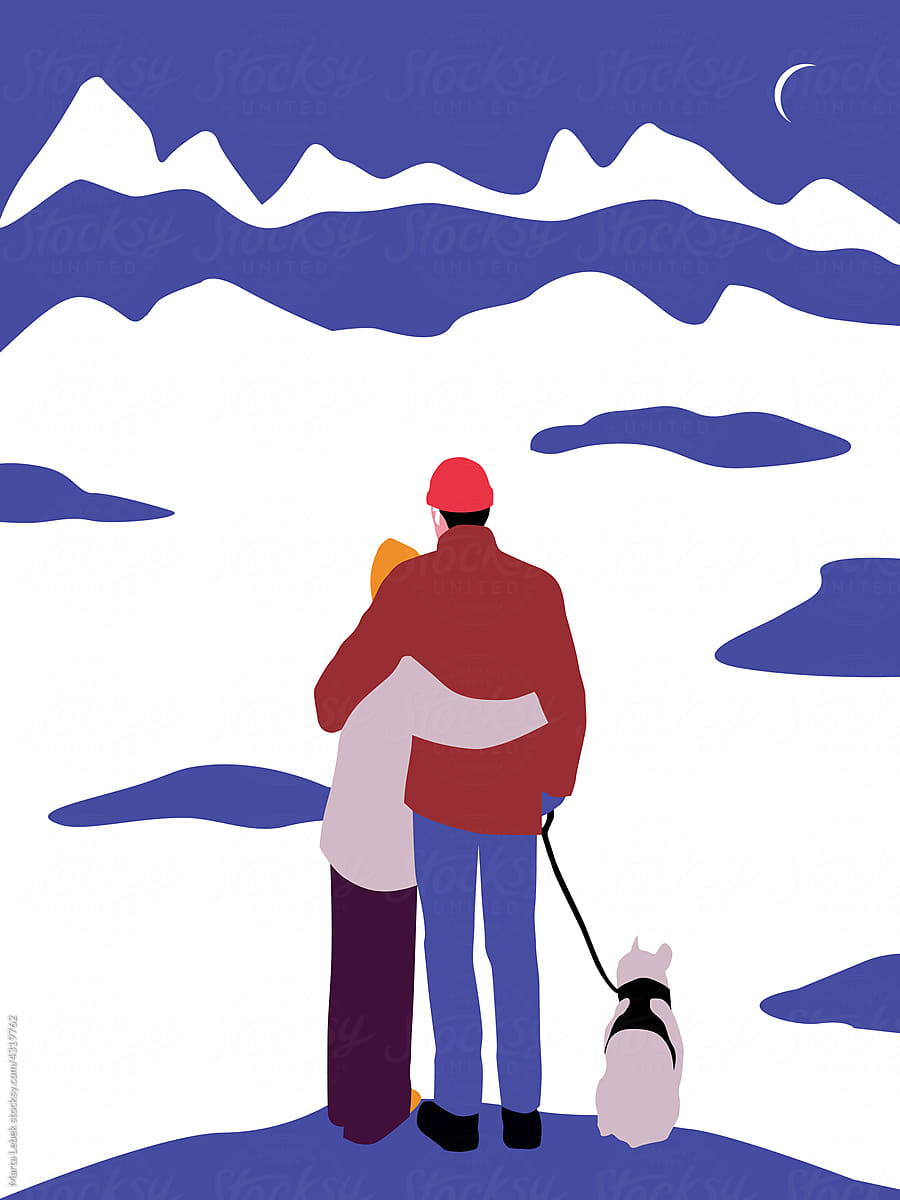 Couple and a dog on a winter walk