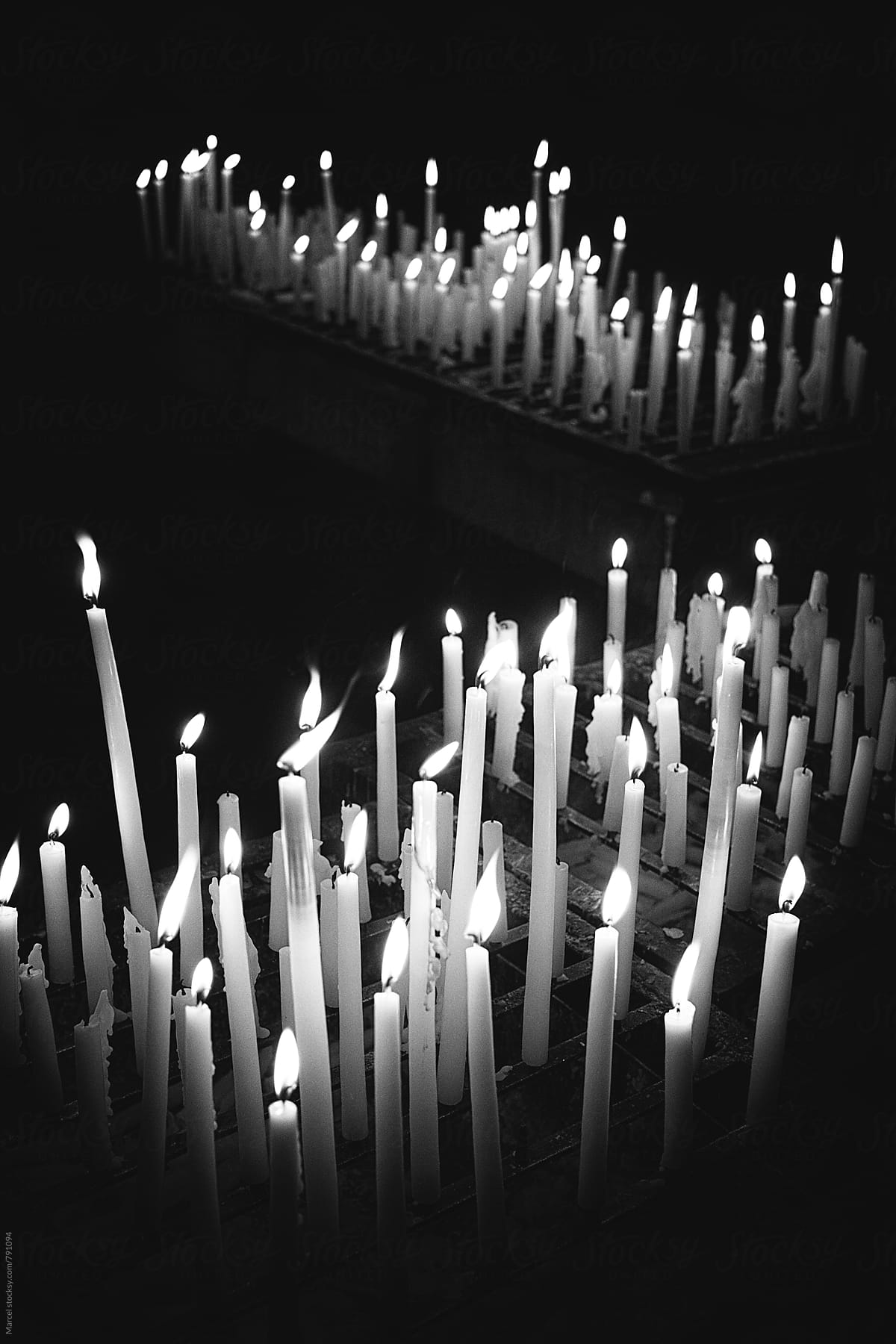 Burning candles in a catholic church