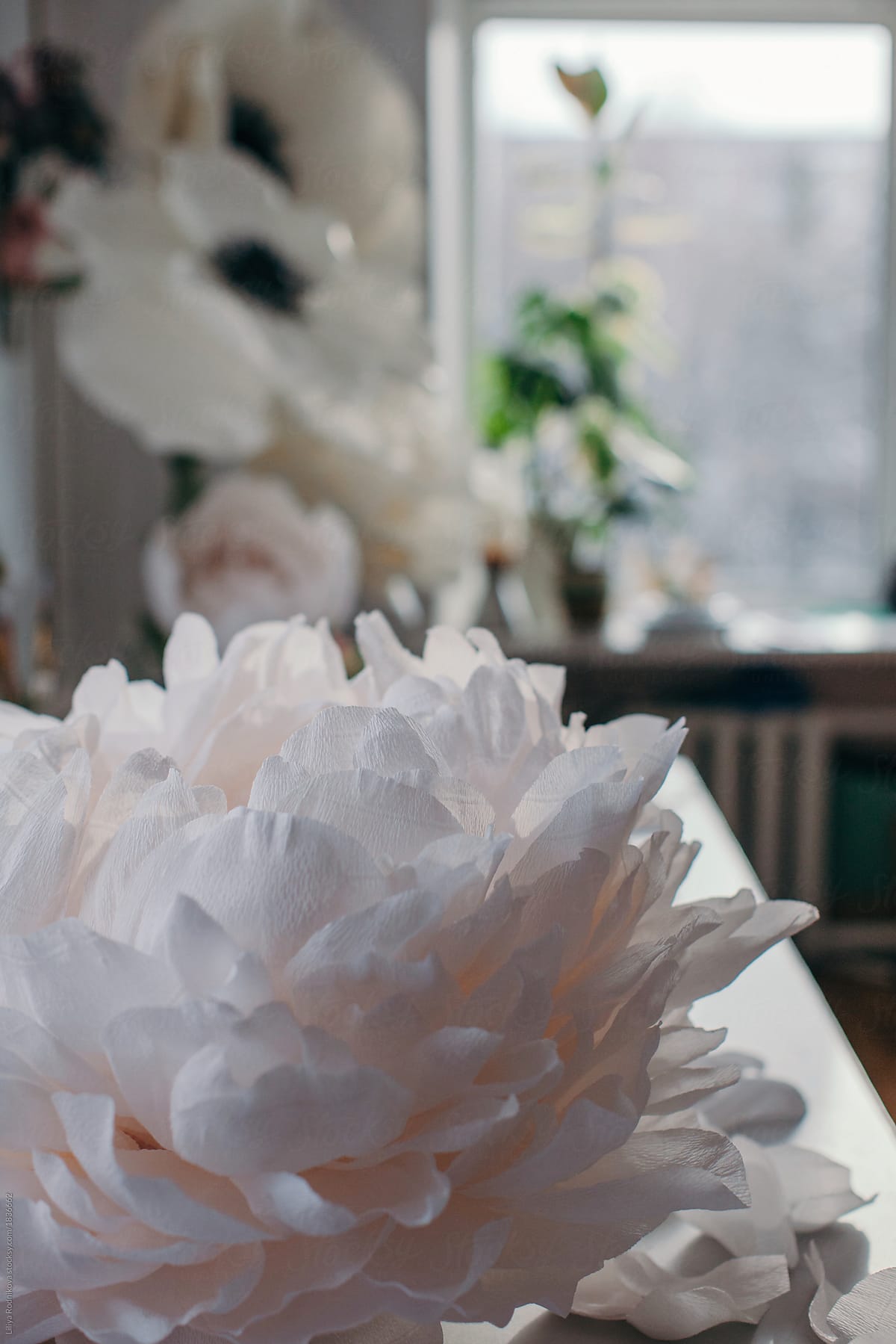 Big paper flower on the table in workshop