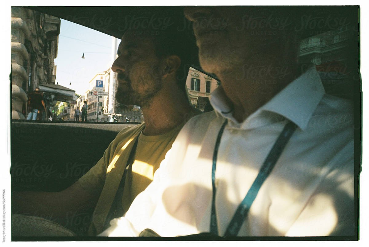 Two men in a cab in Rome