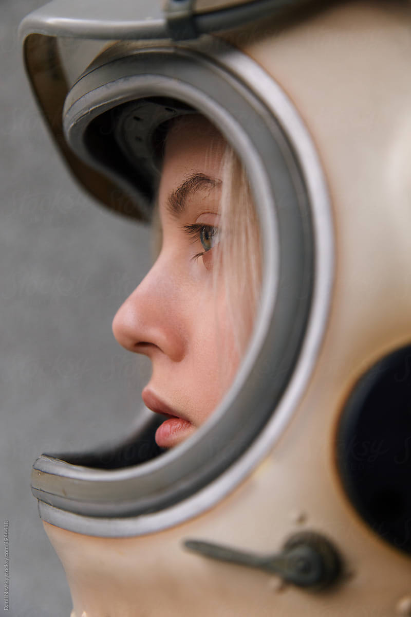 Close-up of woman in space helmet
