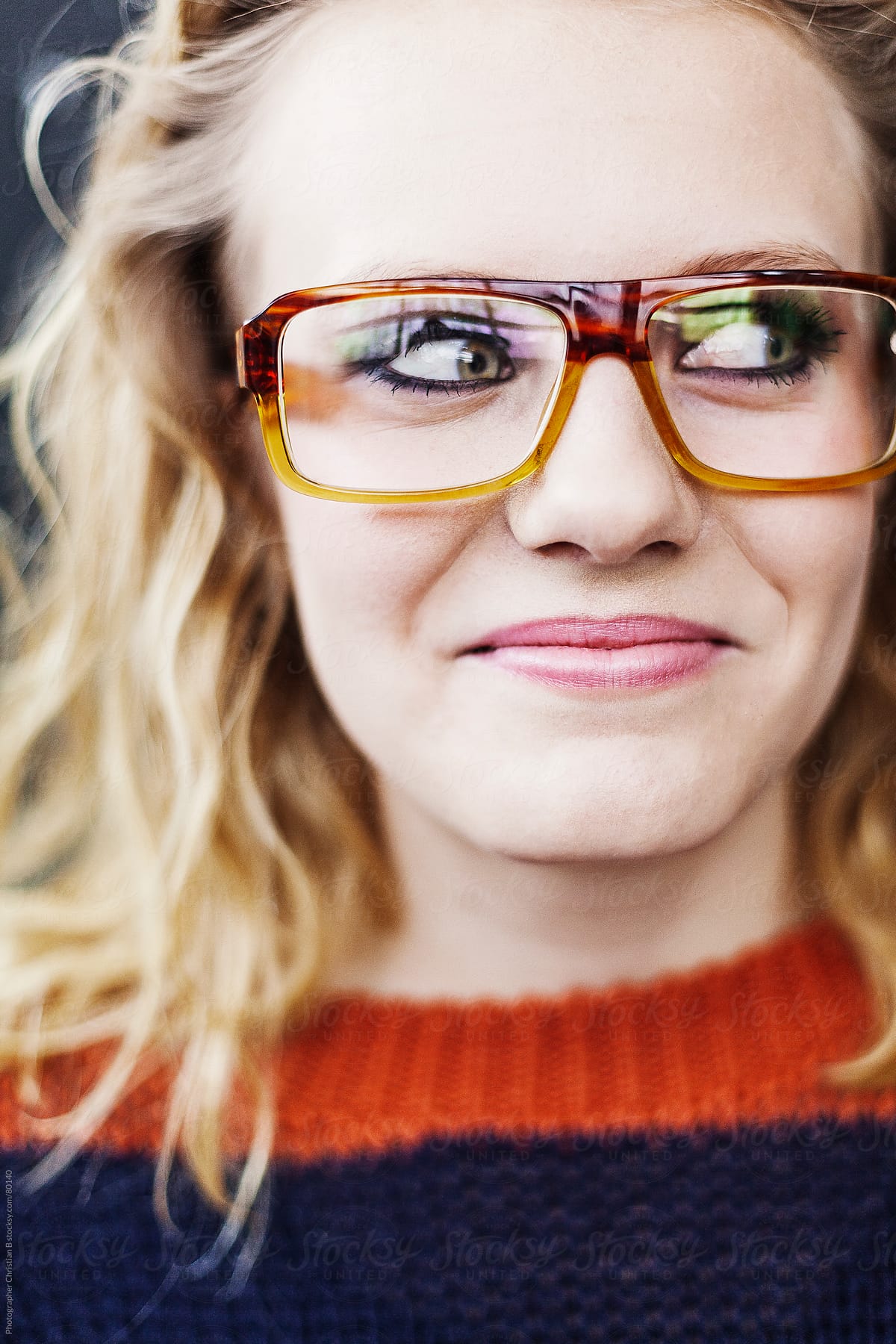 Young Girl With Glasses Looking To The Side By Stocksy Contributor