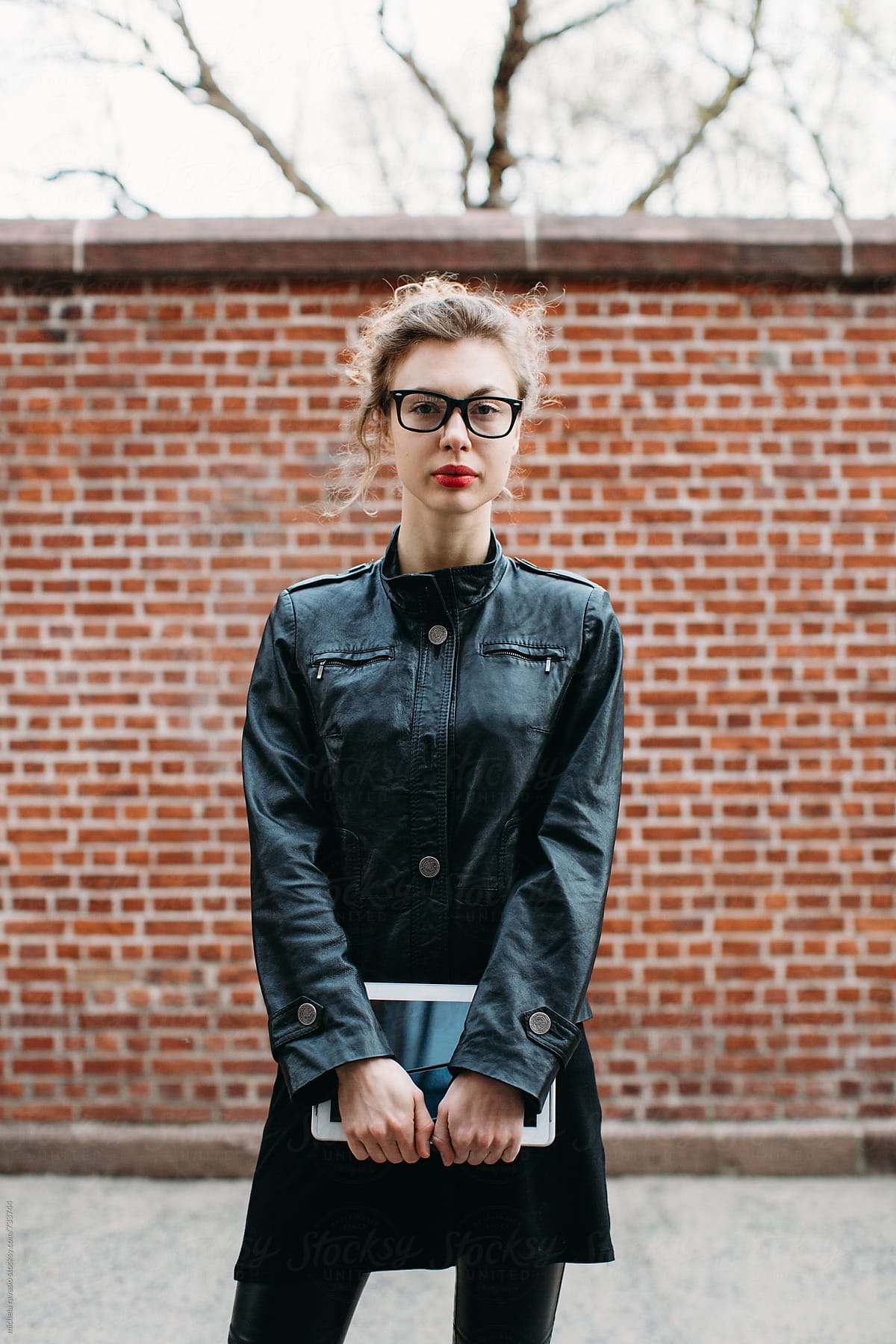 Portrait of young freelance woman looking at camera