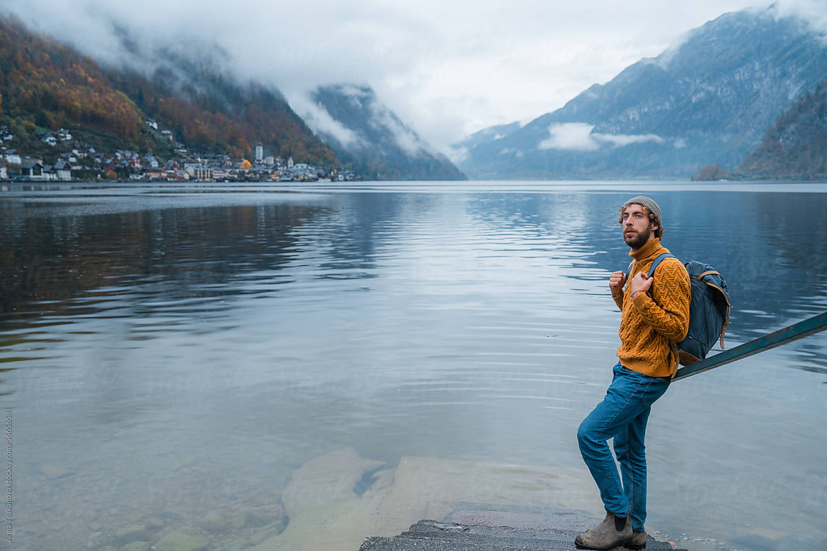 Man standing on the background of the lake in Hallstatt