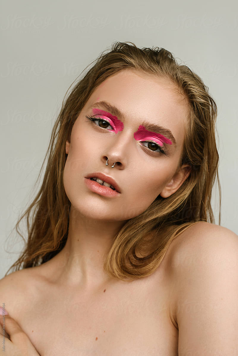 Beauty Portrait Of A Girl With Pink Make Up And Nose Pier