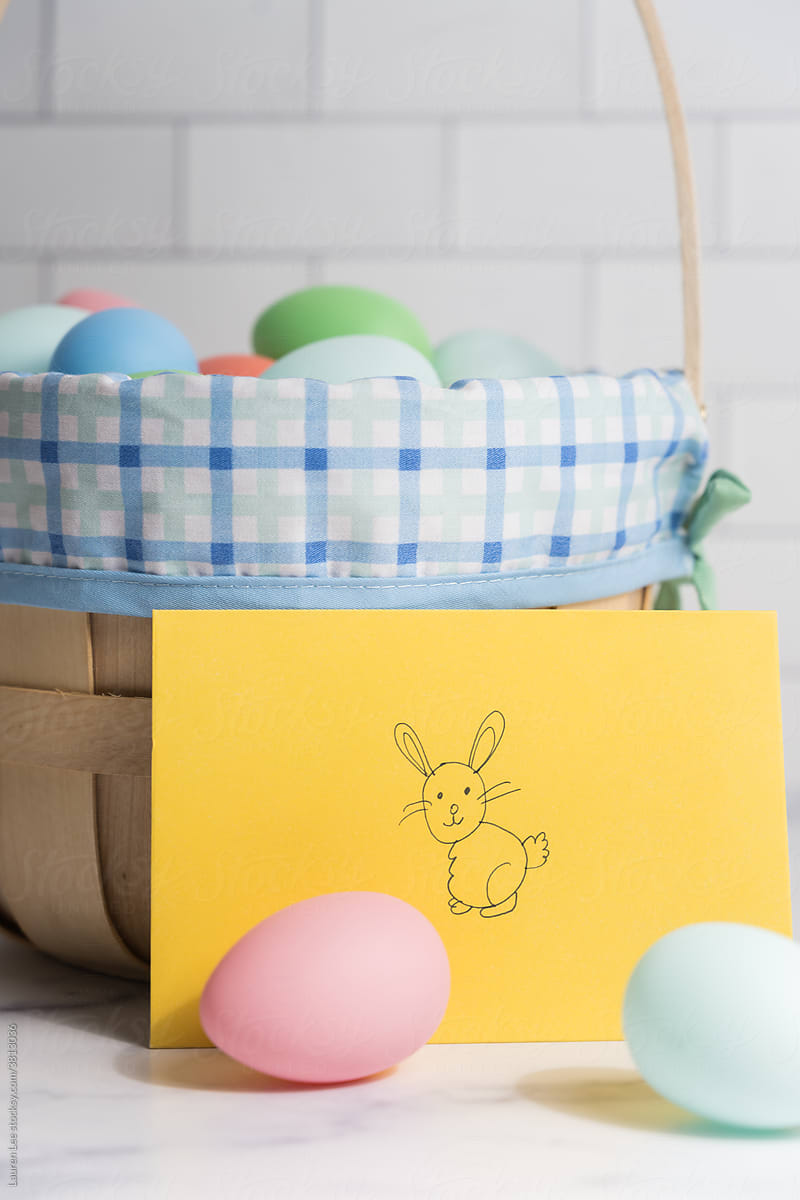 Easter basket with eggs and card