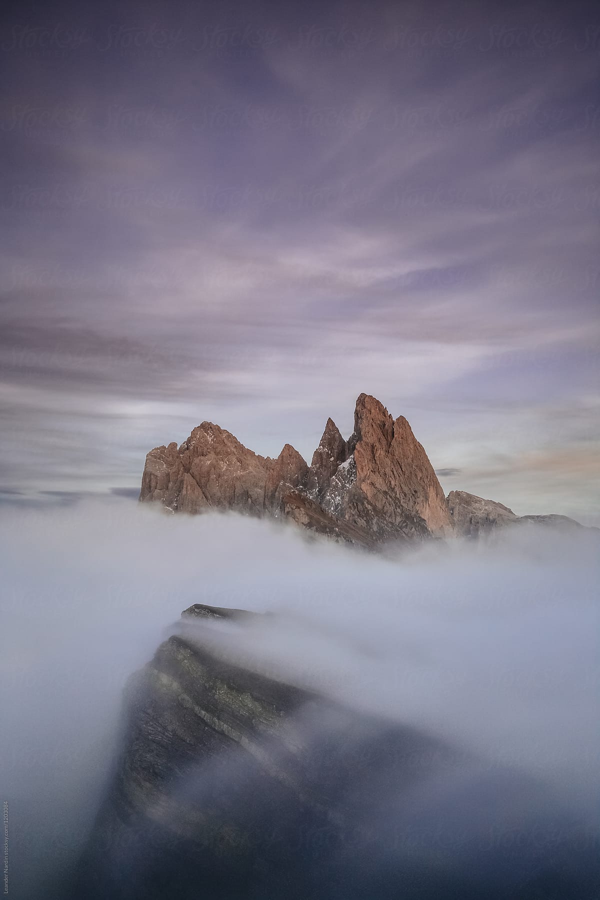 mystic mountain range covered in a sea of clouds - seceda - ital