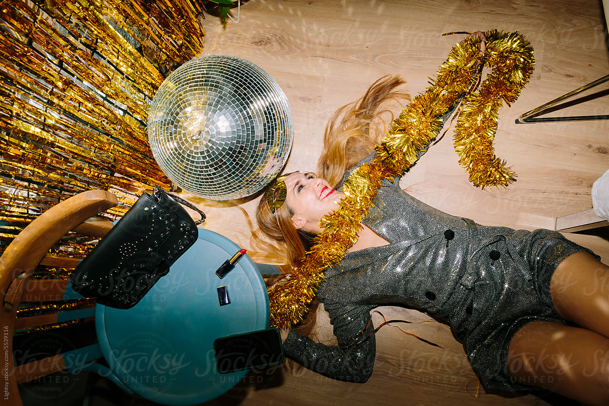 Woman on the floor during New Year\'s Party