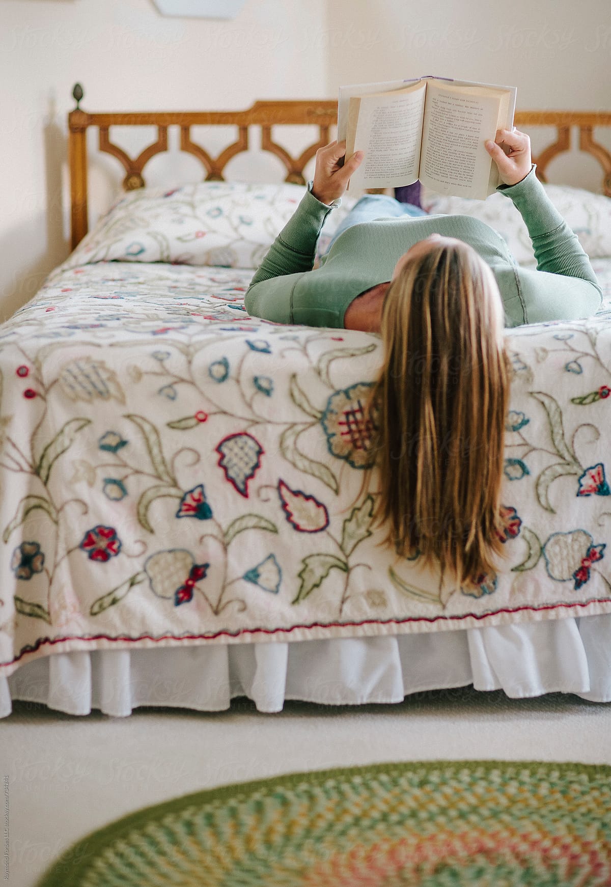 Woman Reading On Bed By Stocksy Contributor Raymond Forbes Llc Stocksy 