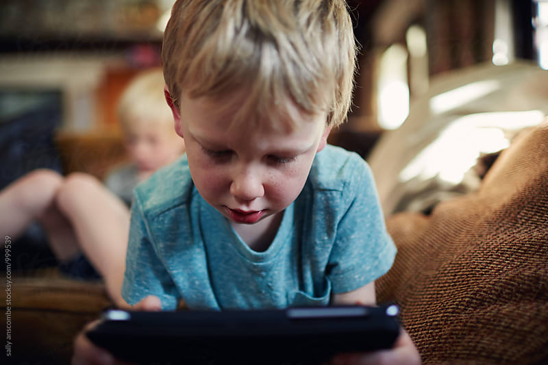 Child using an electronic tablet