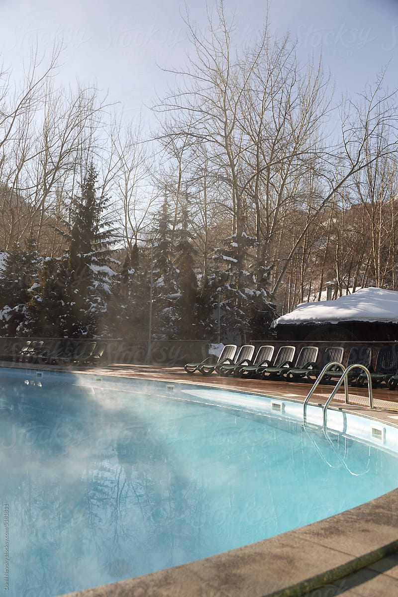 Swimming pool in hotel yard on winter day