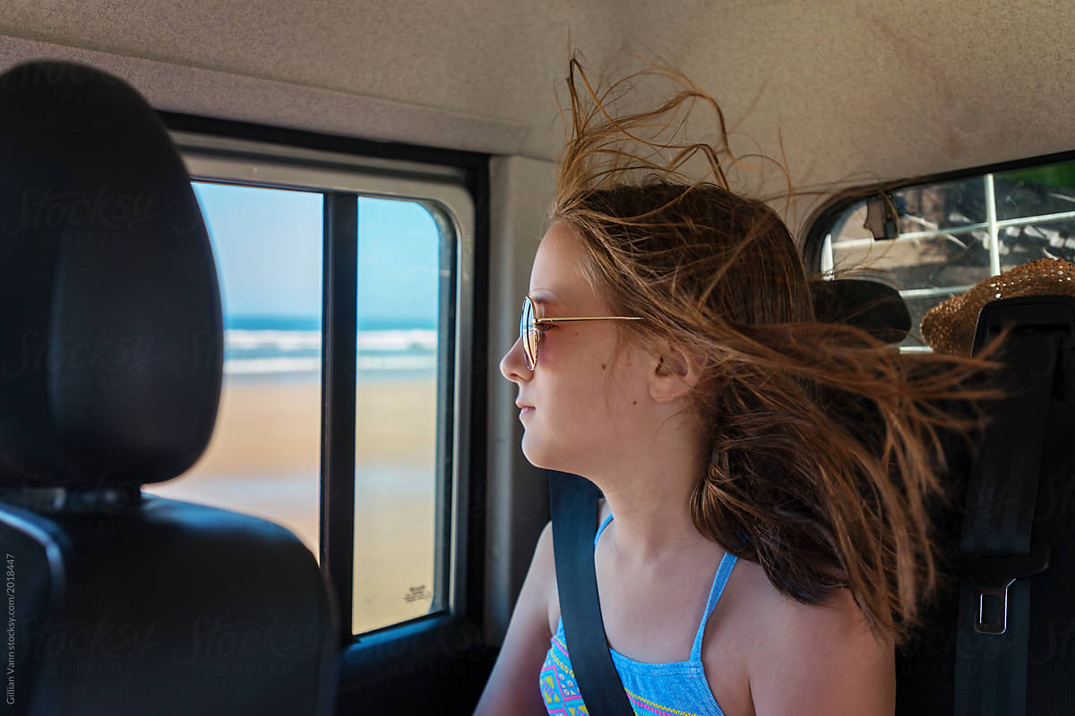 Young Teen In Car At The Beach By Gillian Vann