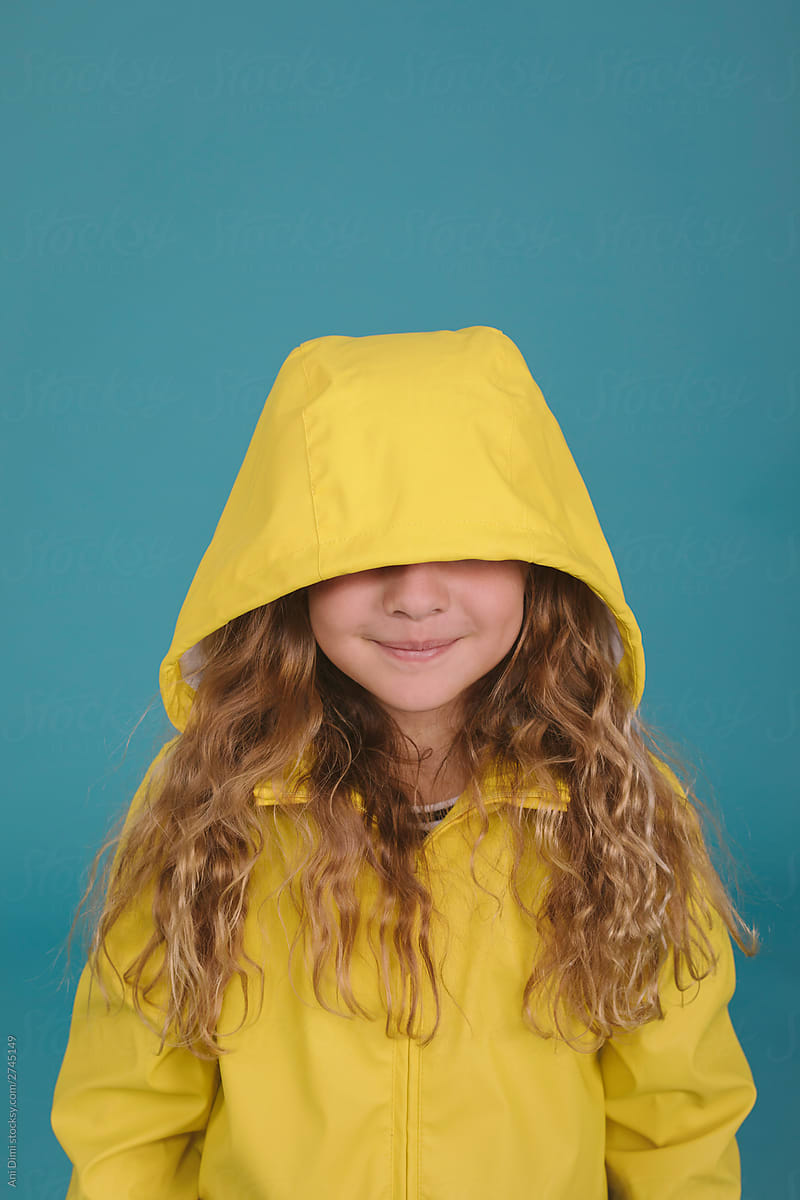 Girl in yellow raincoat