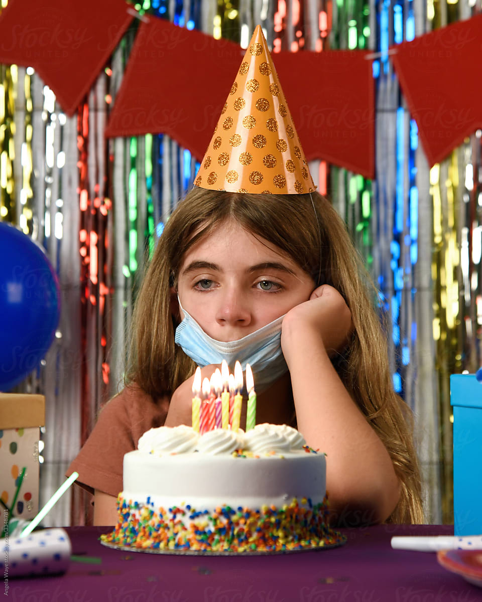 Child Wearing Face Mask with Birthday cake