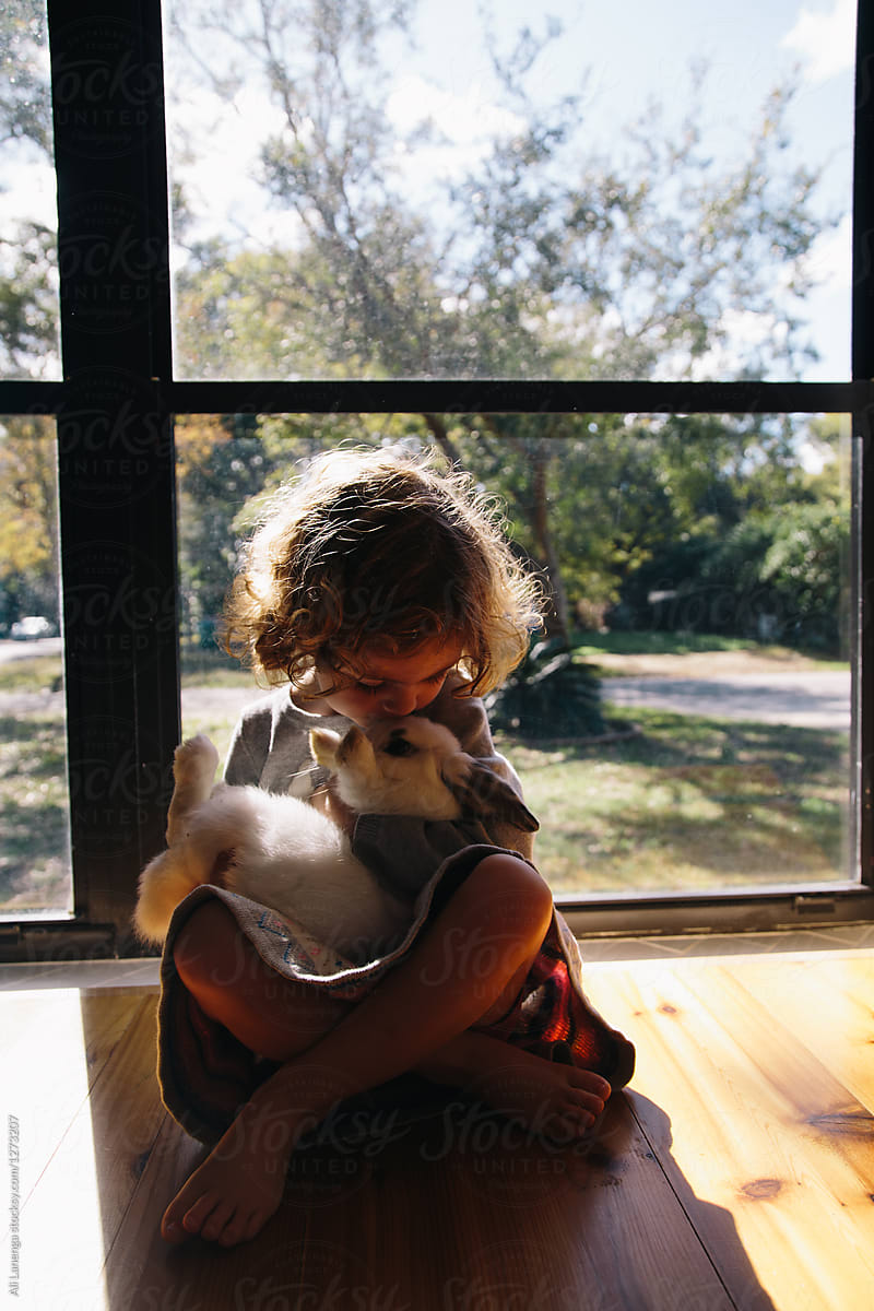 A girl and her pet rabbit