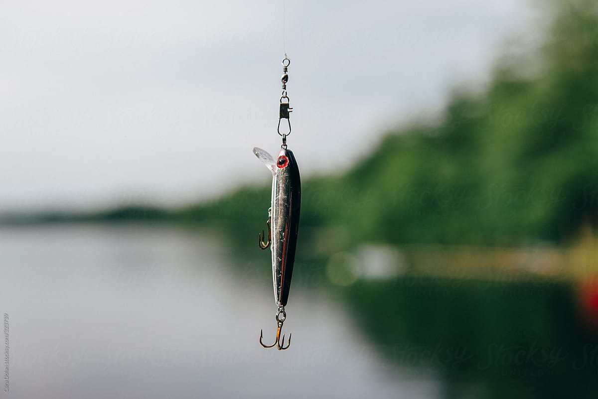 Fishing lure against lake water