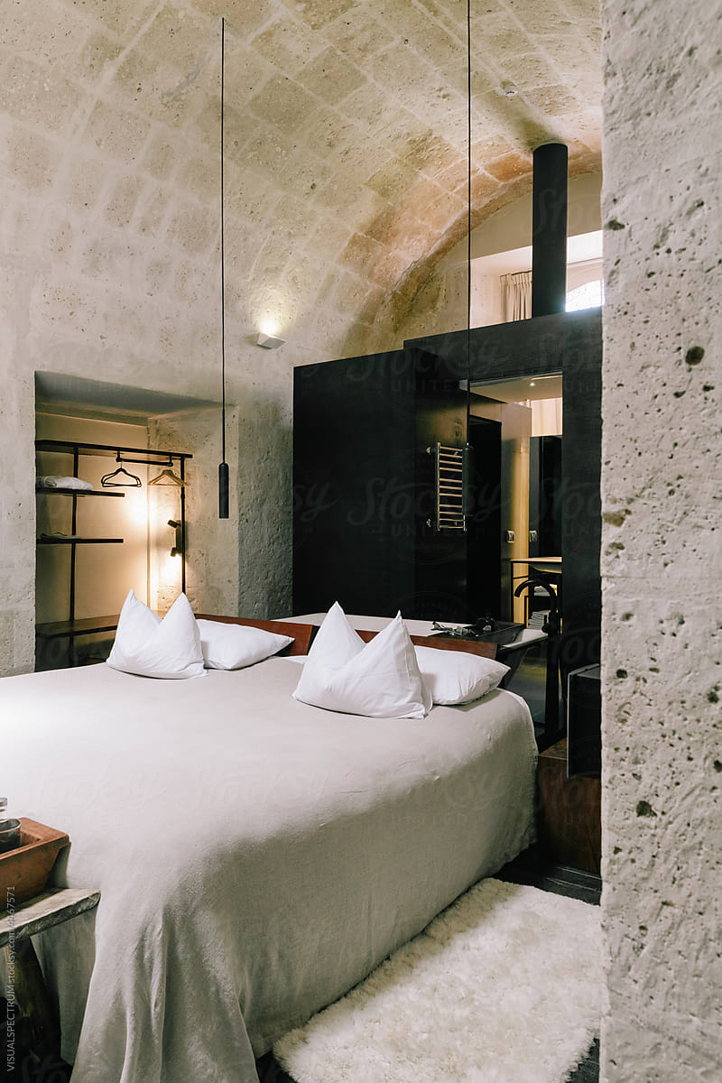 Stylish Hotel Bedroom With Vaulted Ceiling