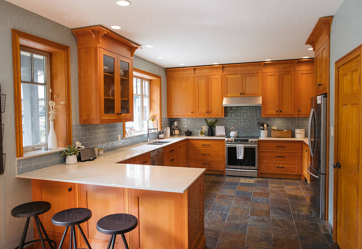 Kitchen with wood cabinets.