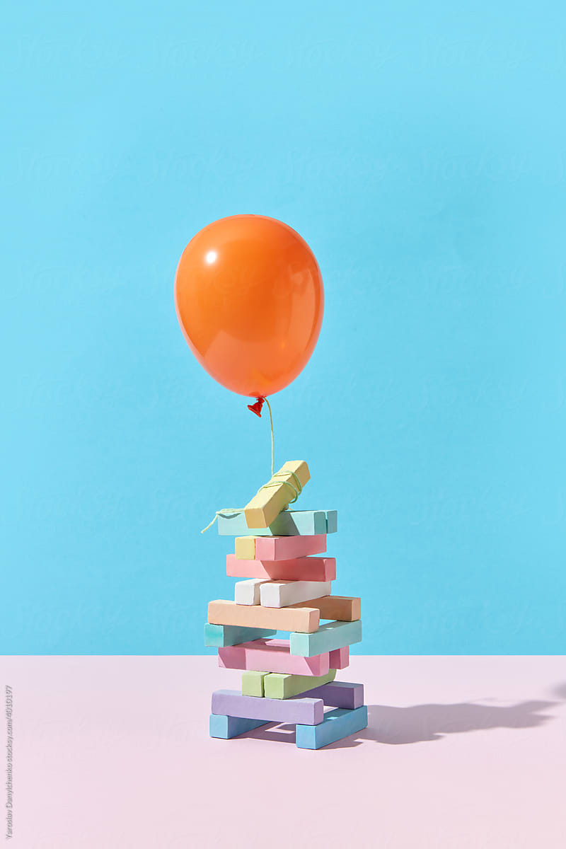 Tower of chalk pieces and balloon