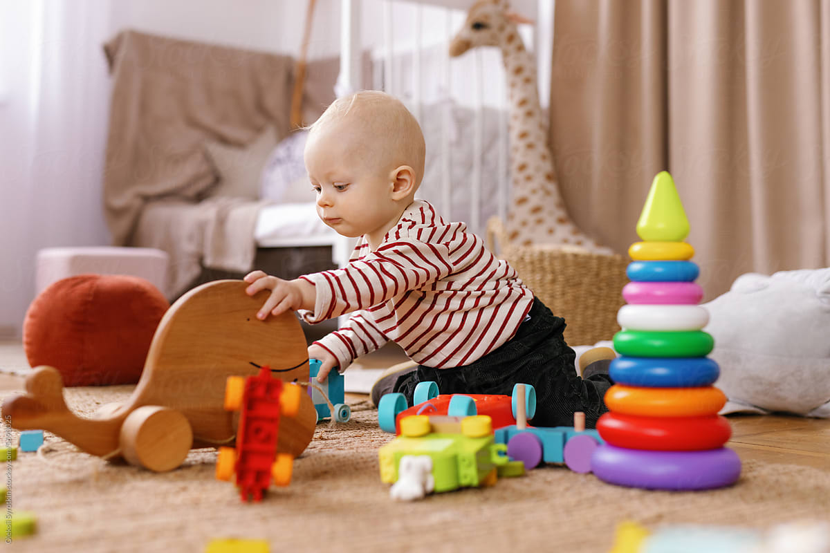 Babyhood plaything play development innocence playroom leisure