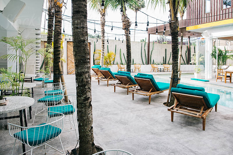 Sunbeds and Chairs in Stylish Empty Tropical Beach Club