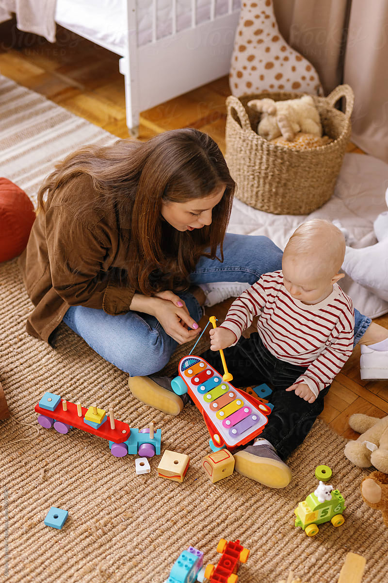 Toddlerhood child-minding plaything amazed leisure activity home