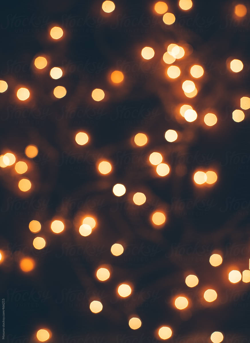 Blurred Christmas Lights  Background  by Mosuno Stocksy United